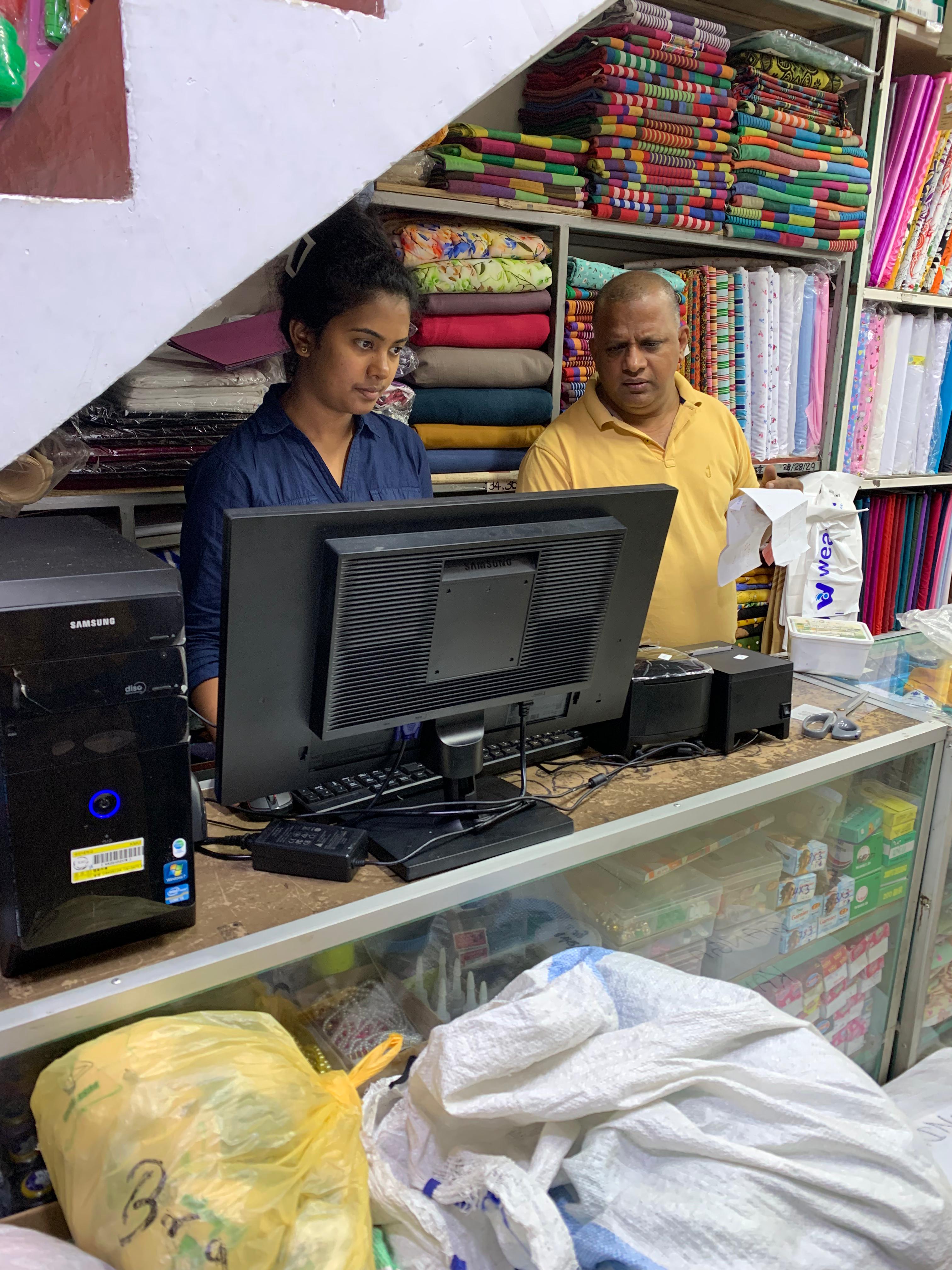 Training session showing staff learning to use the new POS system